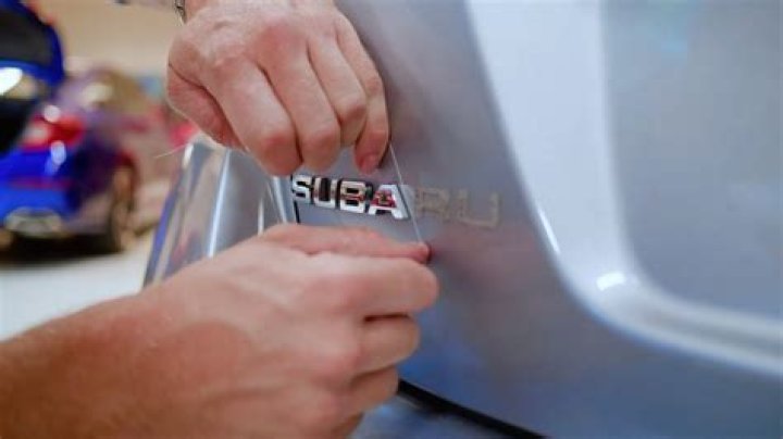 How do I remove the emblems from my car?